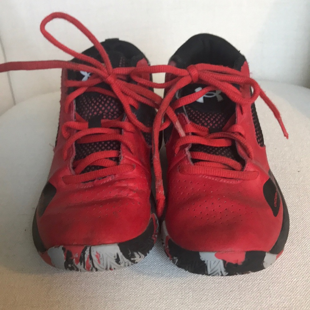 Red and black Under Armour high tops. Youth 1